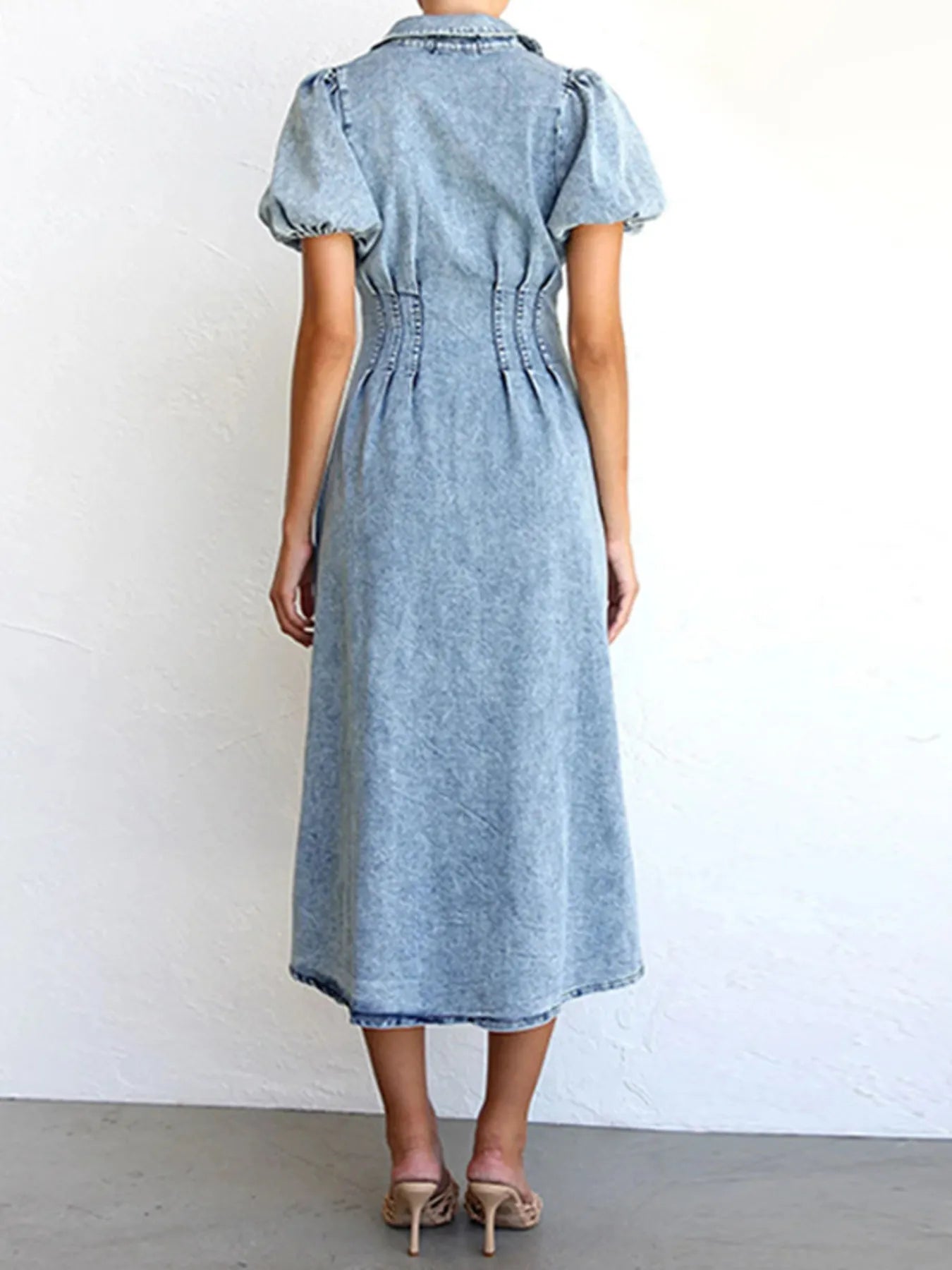 Blue denim midi dress with puff sleeves and gathered back yoke