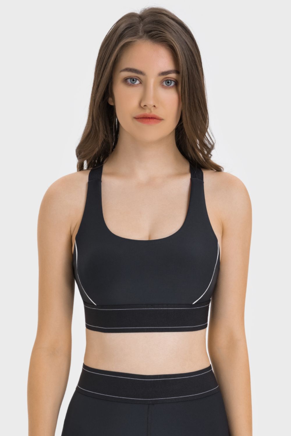 Black contrast sports bra front view with black band detail and scoop neckline