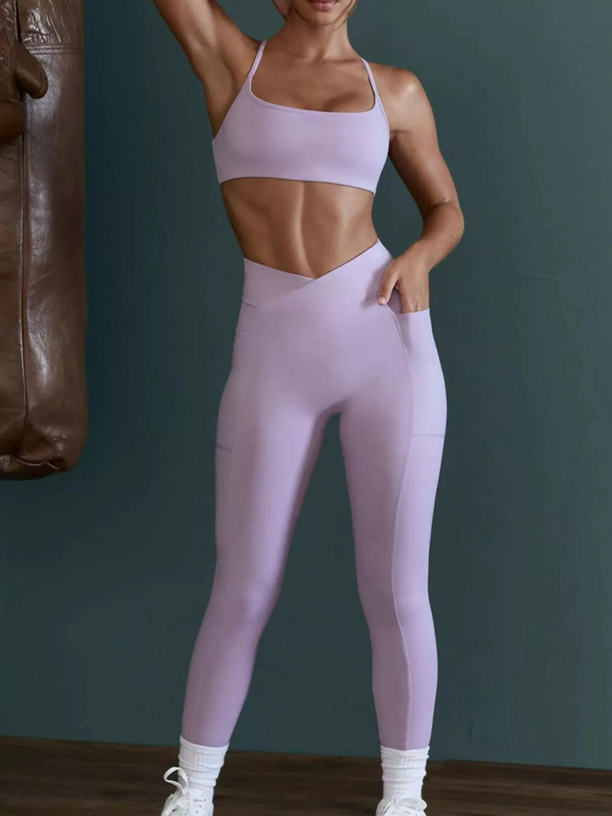 Light purple seamless crisscross cami and high-waist leggings set, front view
