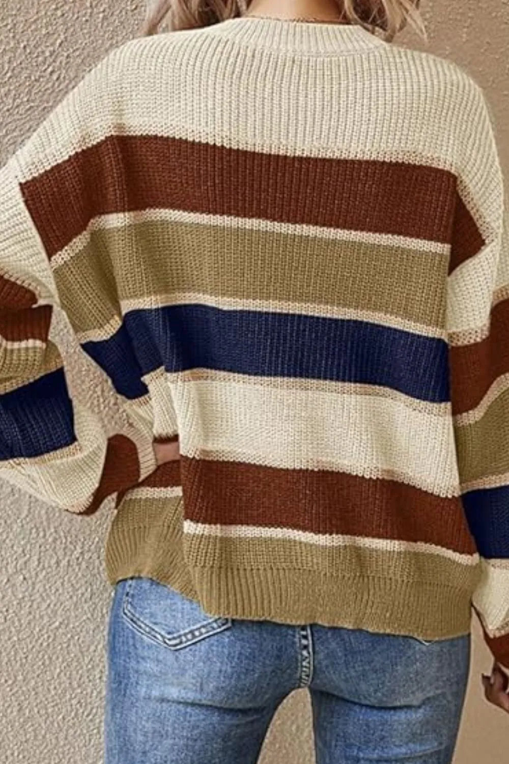 Striped knit sweater back in cream with brown, navy, and olive-green horizontal bands