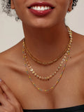 Gold-plated layered resin bead necklace with small oval beads in multicolor layers