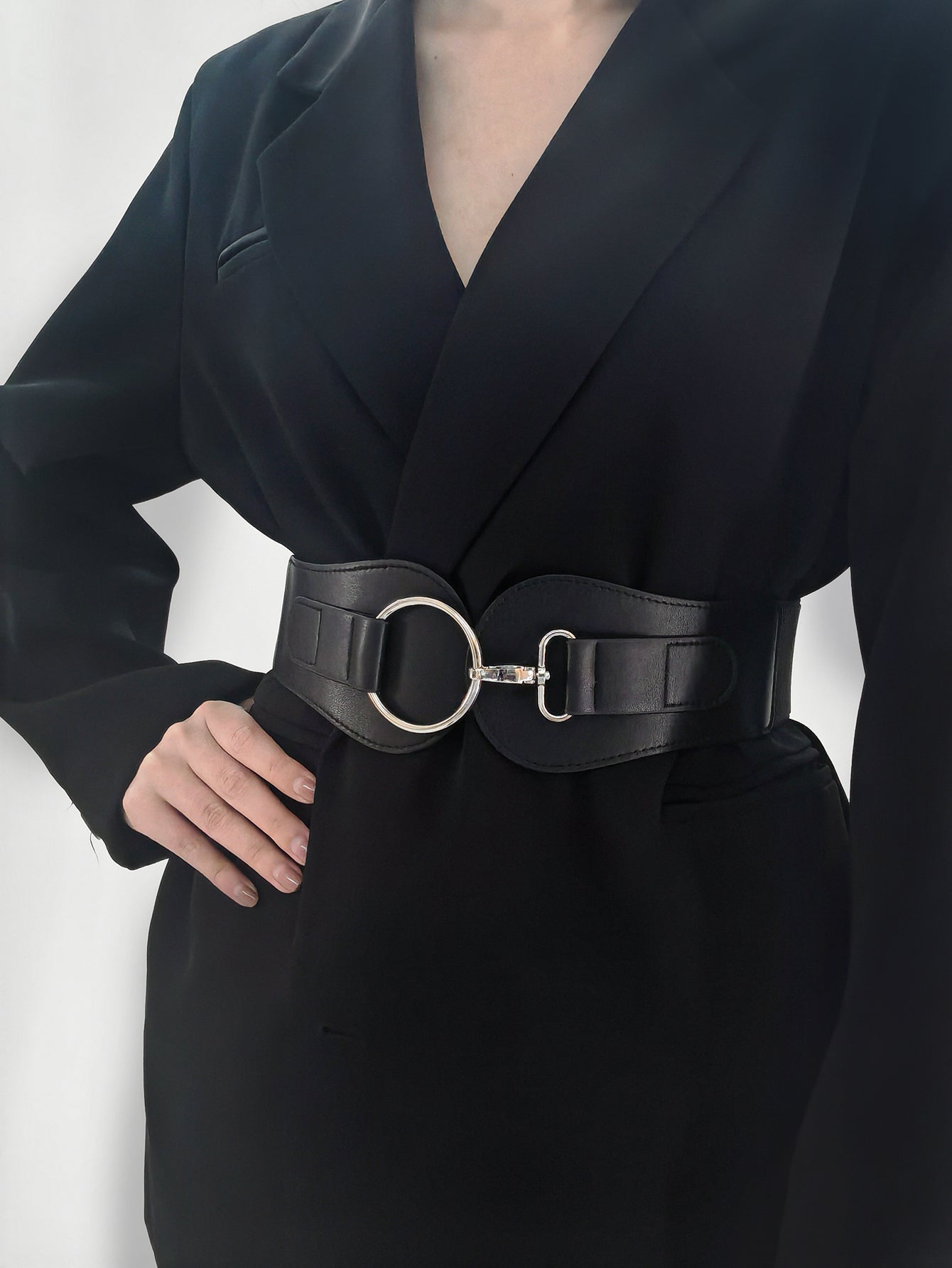 Black vegan leather wide elastic belt with O-ring buckle and adjustable side tabs