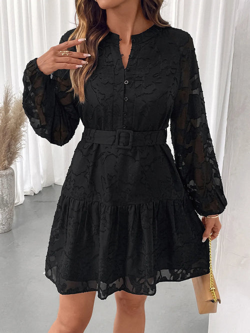 Black button-front balloon sleeve mini dress with tiered skirt and waist belt