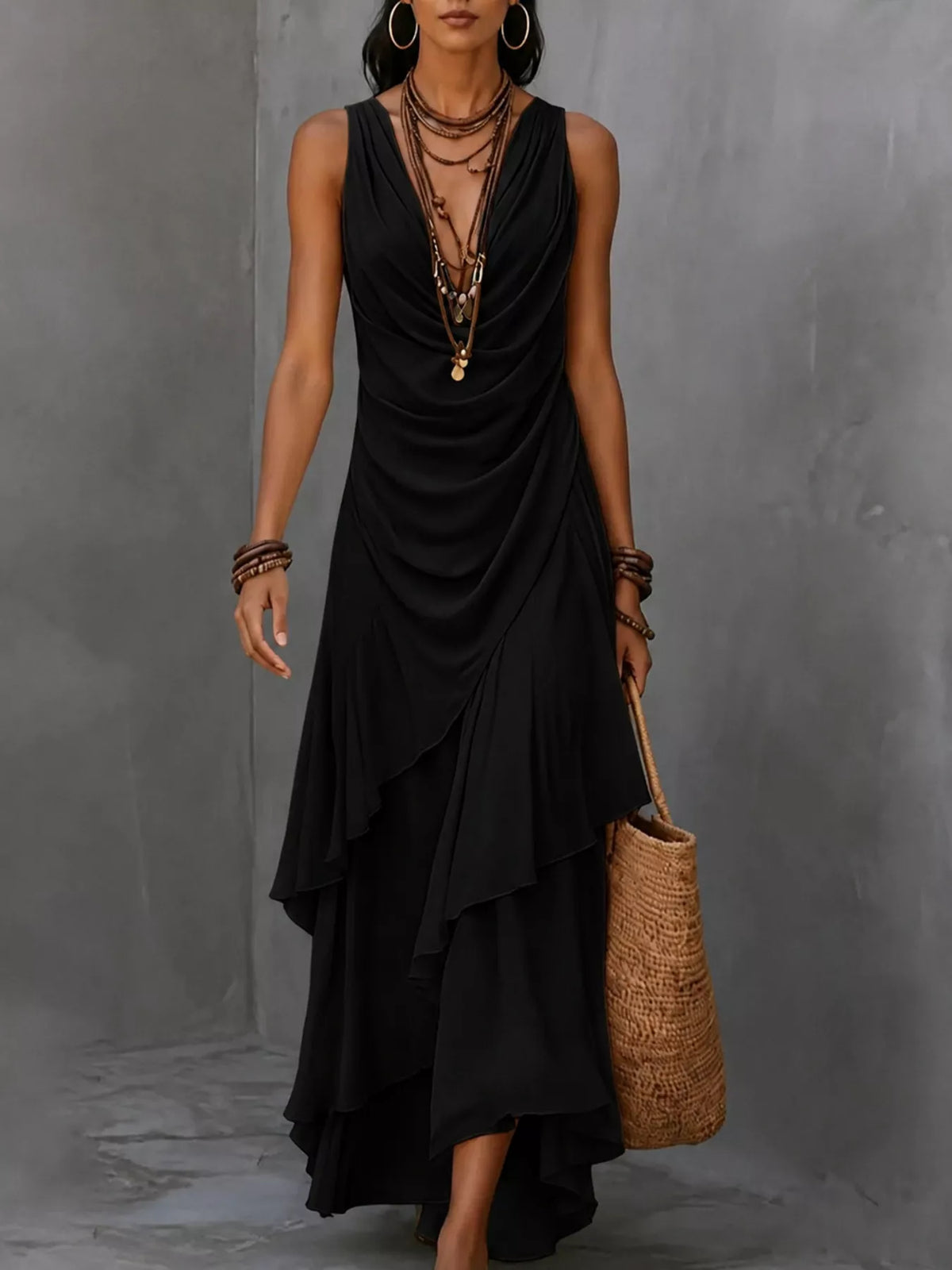 Black sleeveless layered maxi dress with ruched cowl neckline and tiered ruffled hem