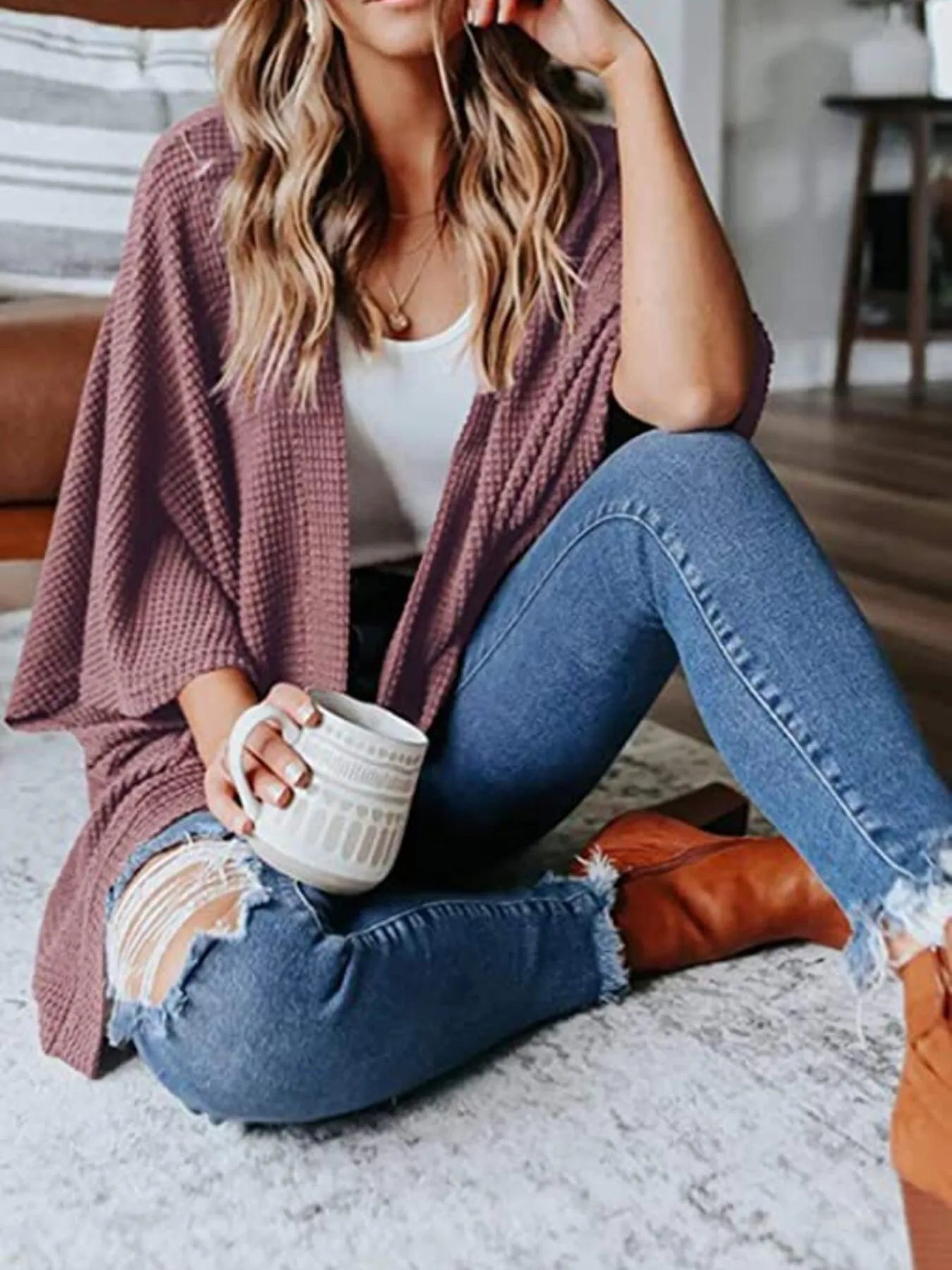 Waffle knit open-front cardigan with short batwing sleeves, mauve-pink over jeans