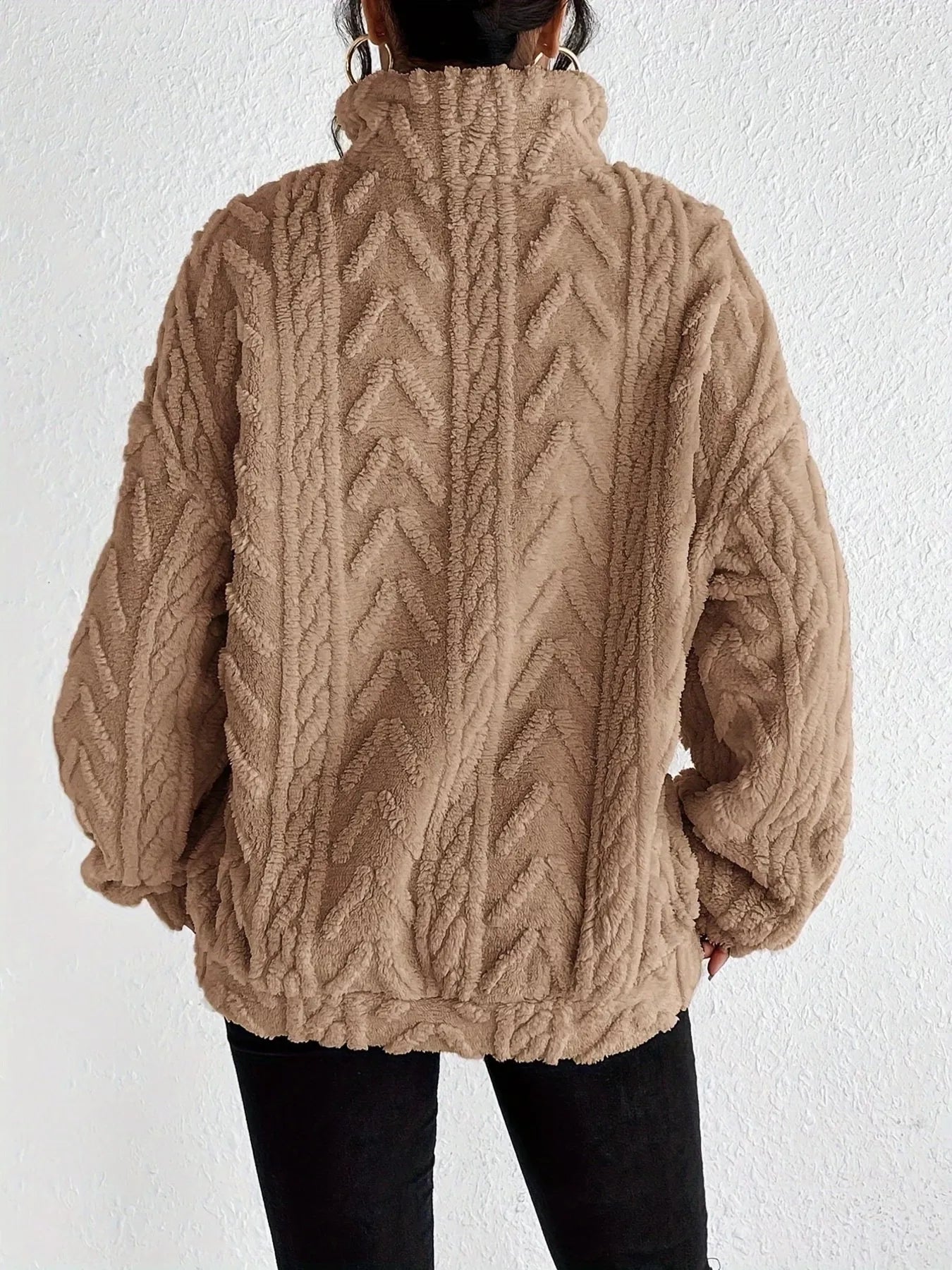Beige sherpa quarter-zip sweatshirt with cable-knit texture and dropped shoulders (back view)