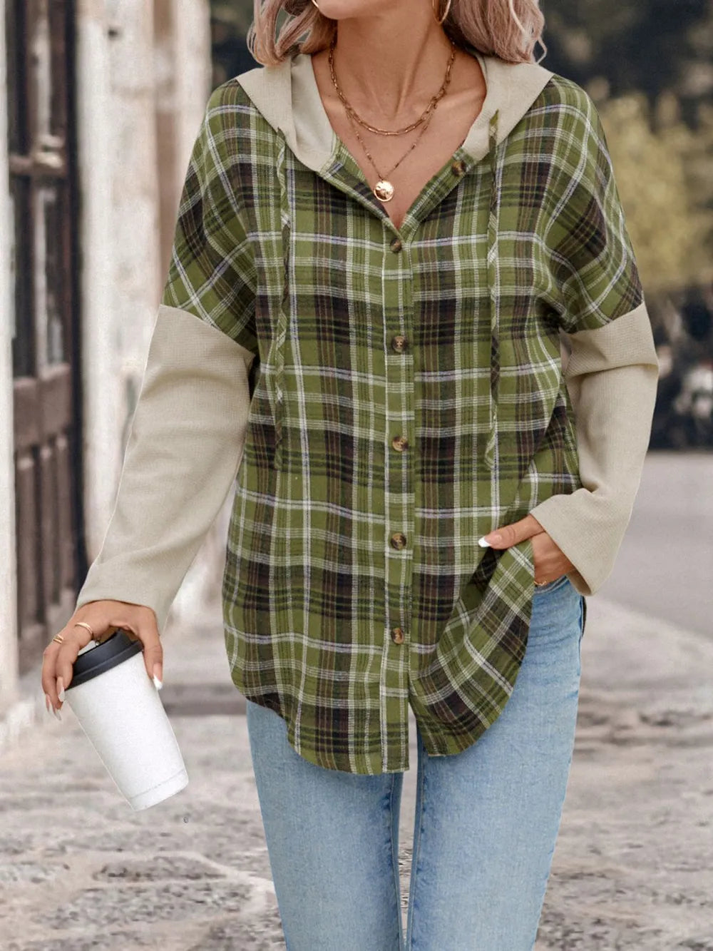 Green plaid hooded long-sleeve shirt with button front and contrasting beige cuffs