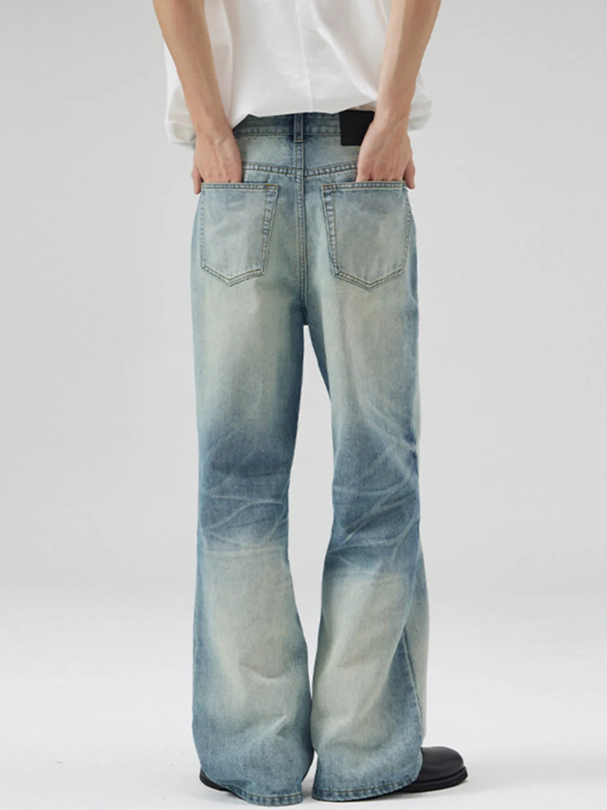 Washed wide-leg cotton jeans, pale blue with belt loops and two front patch pockets