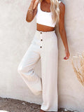 White high-waisted textured wide-leg pants with button front