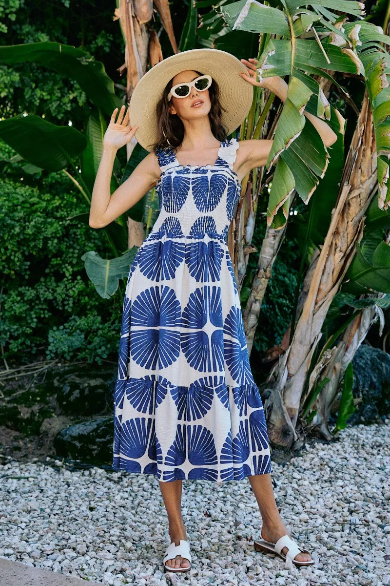 Smocked bodice tiered midi dress with navy abstract print pattern on white, sleeveless