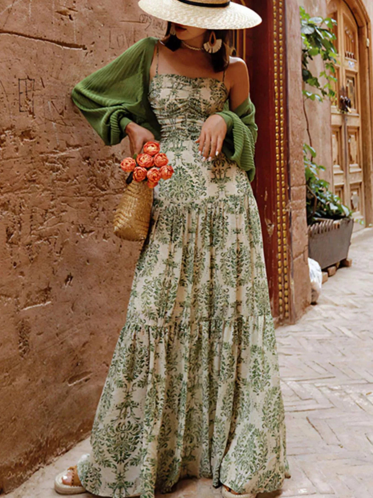 Sage green printed tiered maxi dress with spaghetti straps and cutout back