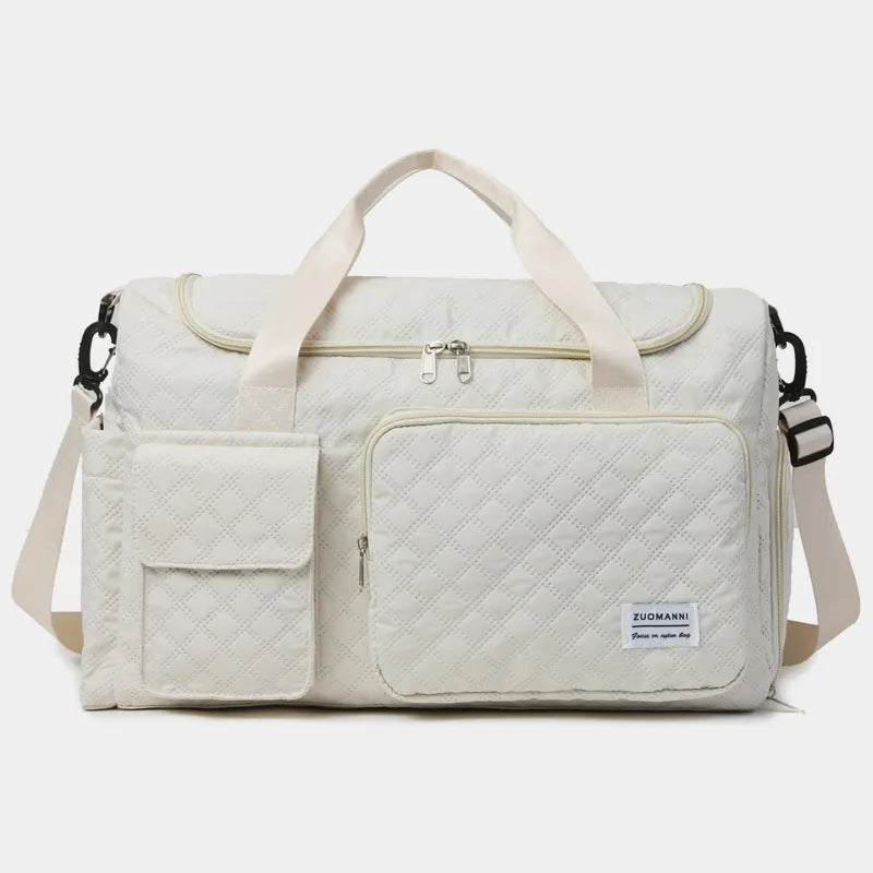 White travel duffel bag with multiple front pockets and top zip compartment
