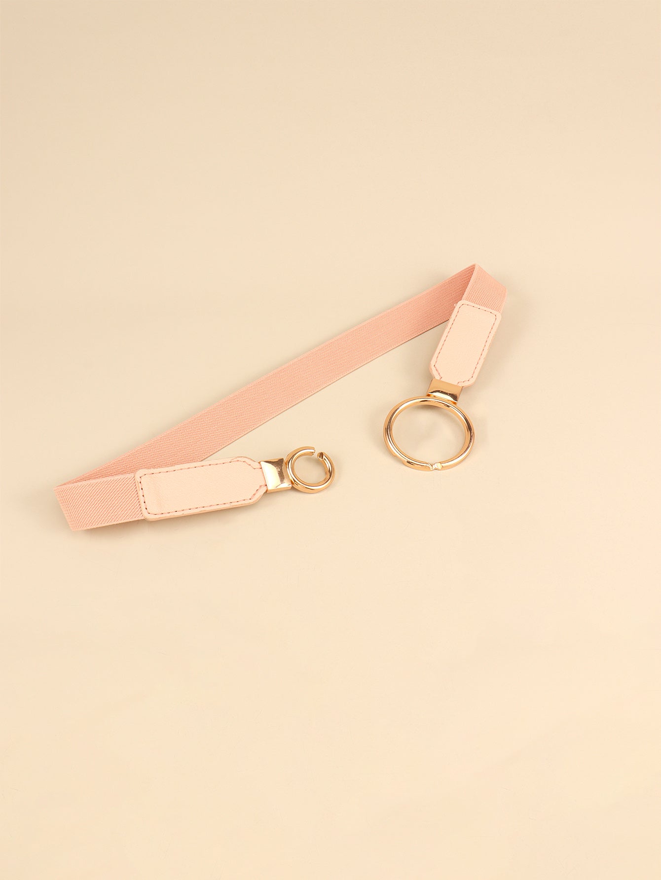 Peach elastic vegan leather belt with double ring buckle and strap tabs