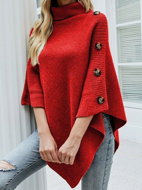 Red turtleneck poncho pullover with ribbed sleeve cuffs and button trim