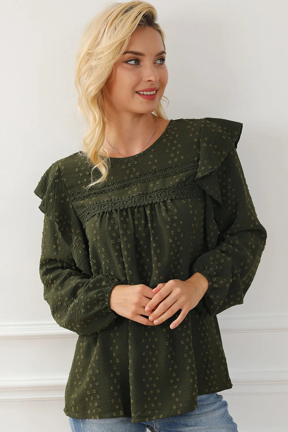 Ruffled round-neck blouse in dark olive green with puffed ruffle sleeves and long cuffs