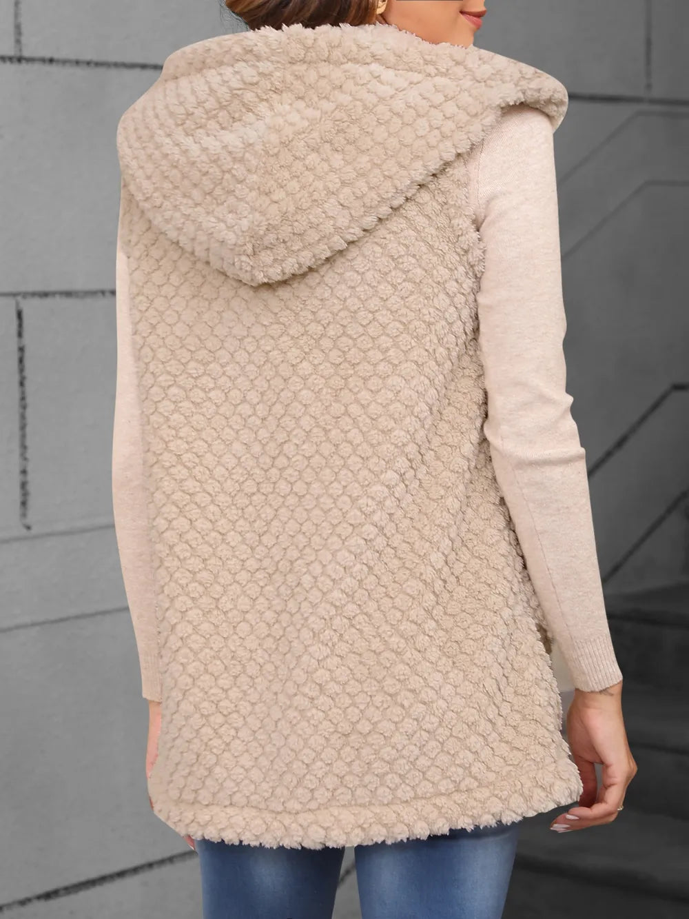 Back view hooded textured vest coat in light beige with full hood