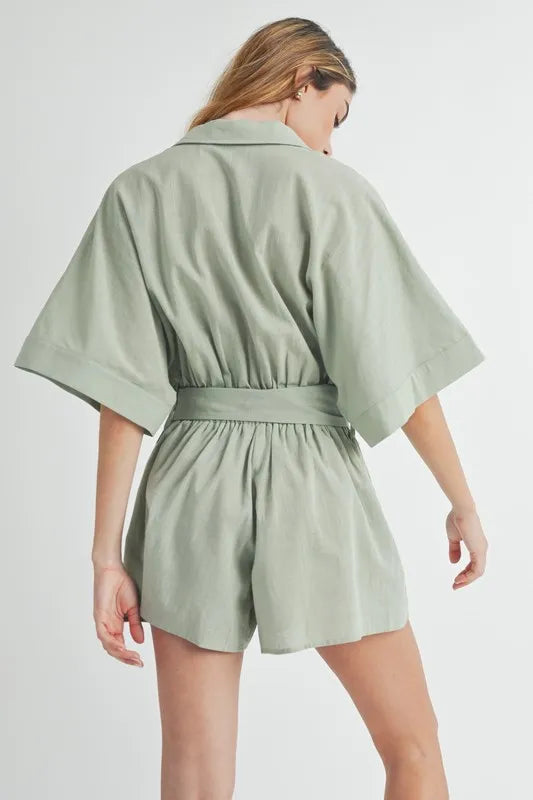Dusty sage back view romper with gathered waist tie and short sleeves