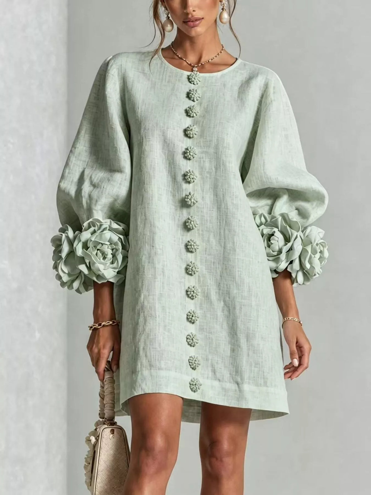 Mint blue mini dress with 3D floral appliqué, quarter sleeves, and relaxed fit