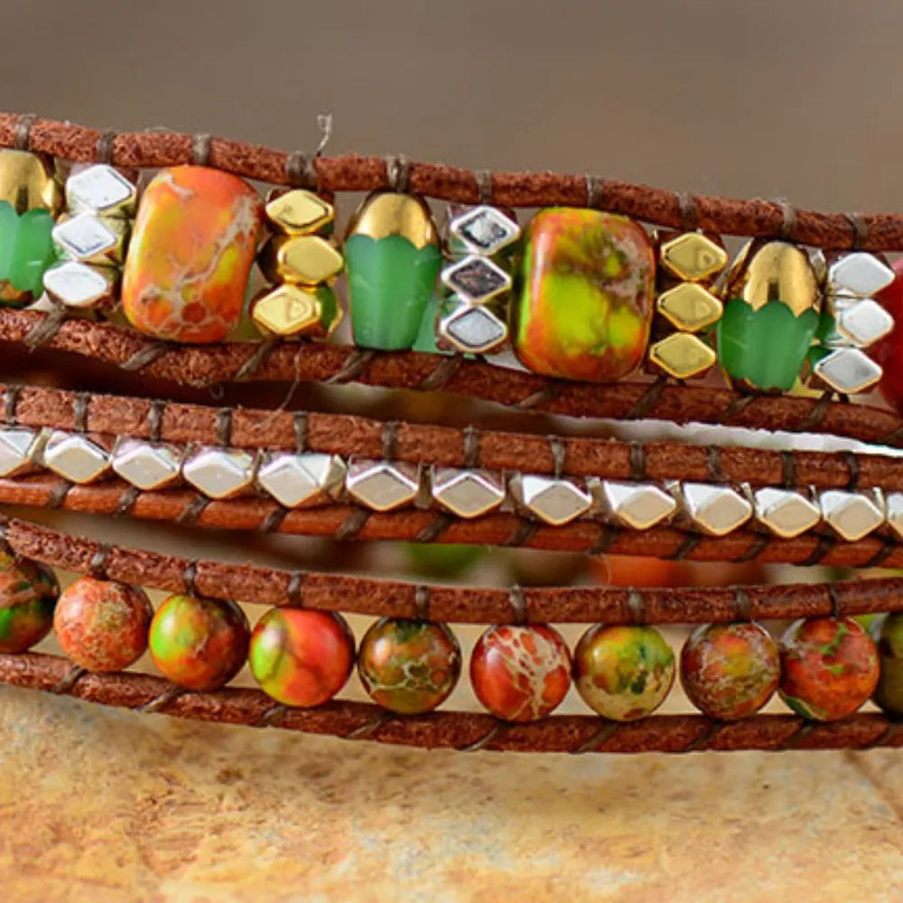 Natural stone woven bracelet with three rows of multicolor stones and woven brown leather
