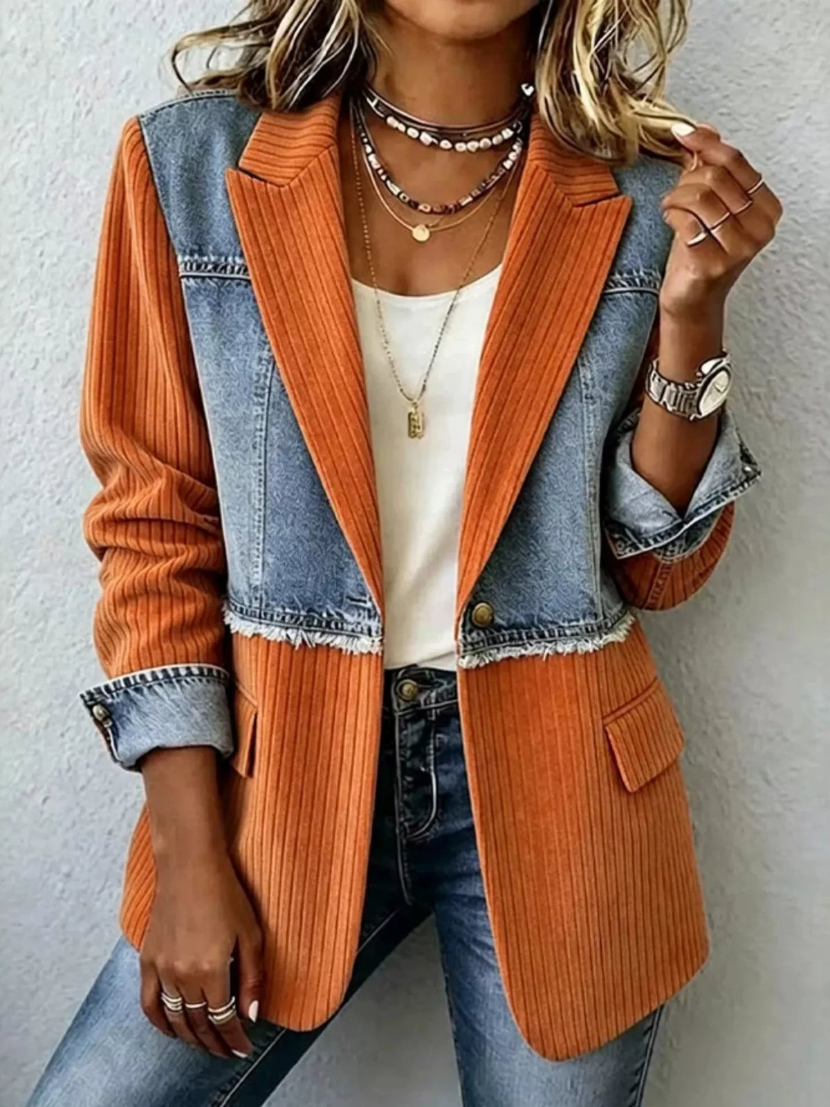 Orange and blue denim patchwork blazer with ribbed texture and flap side pocket.