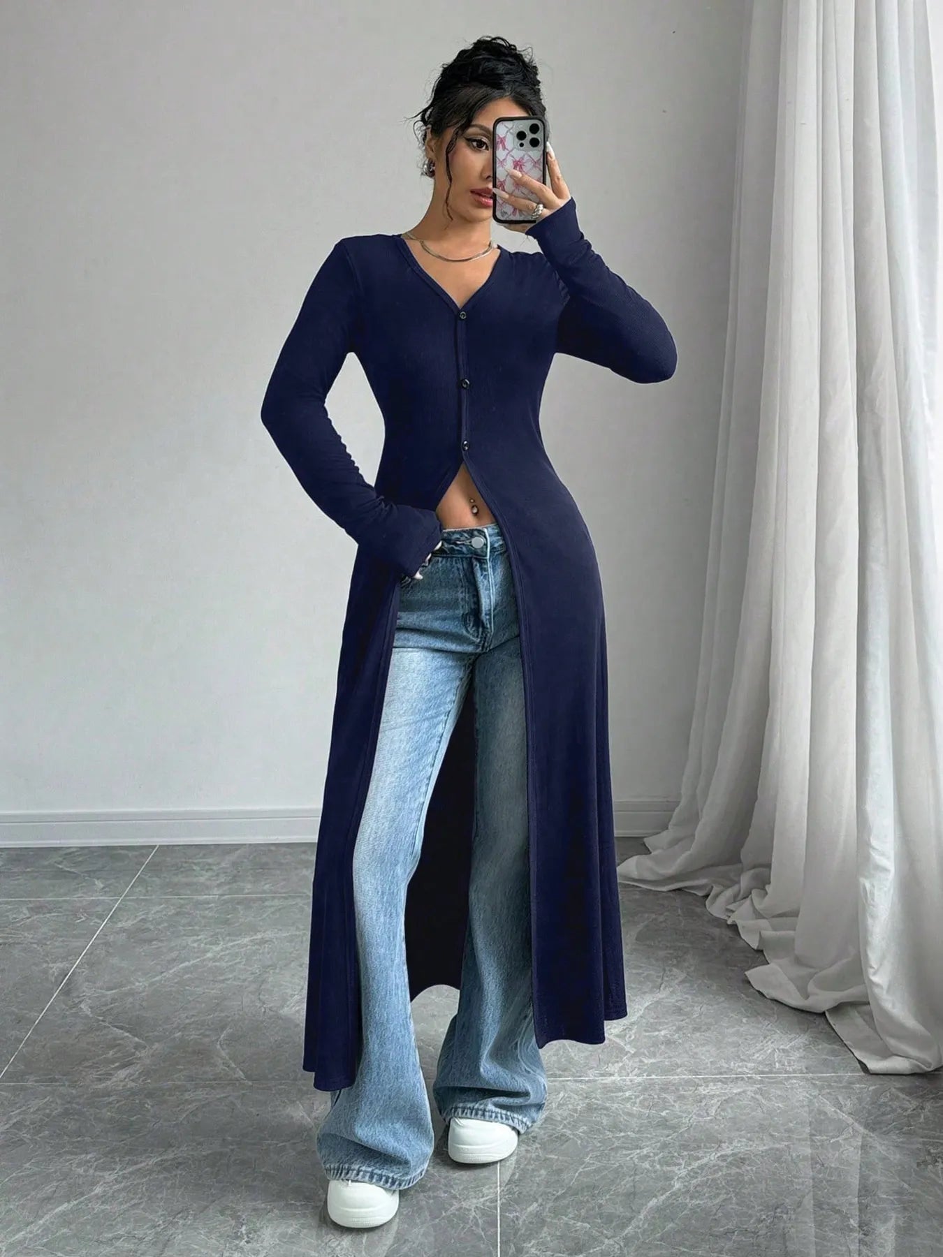 Longline V-neck button-front cardigan in dark blue with long sleeves, open front