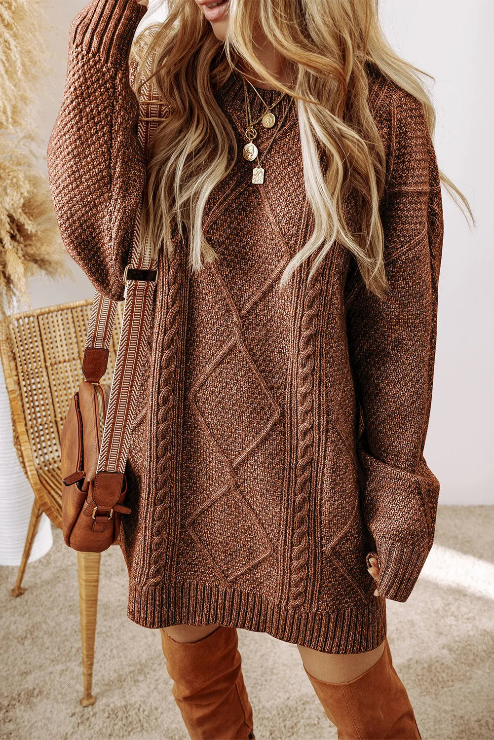 Brown cable-knit round-neck sweater dress with diamond cable design and long sleeves