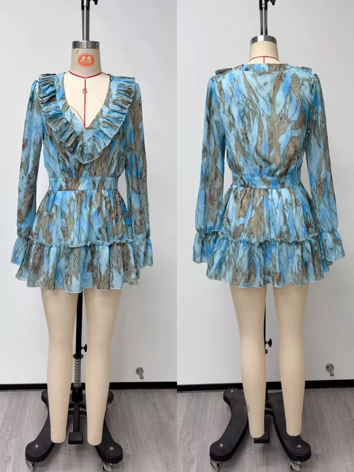 Pastel blue boho V-neck ruffled long-sleeve mini dress on mannequin, front and back