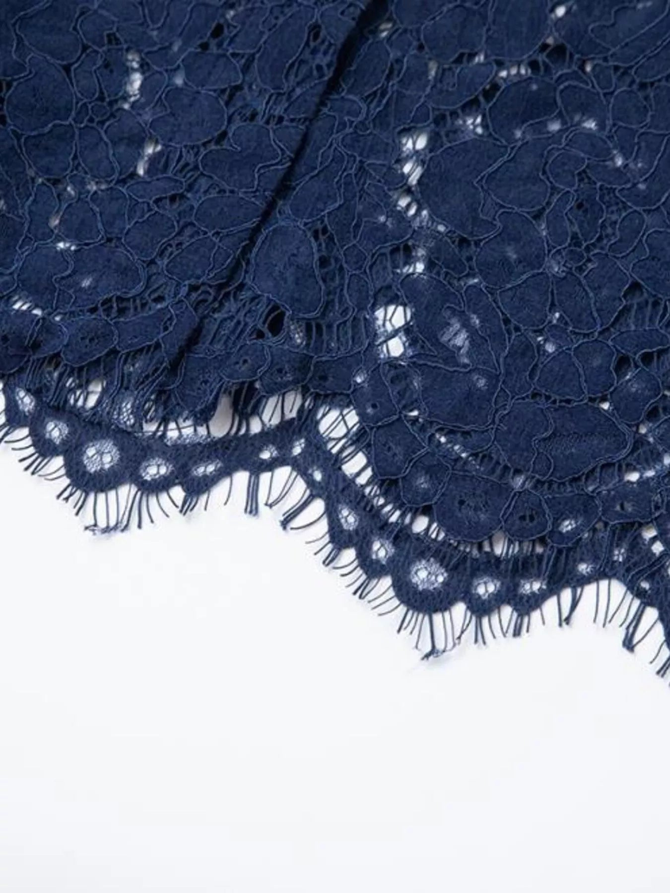 Cedar & Moore Lace Button-Down Midi Dress in navy lace with floral pattern and fringe hem