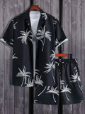 Men's palm print button-up shirt and shorts set, black with white palm leaves.