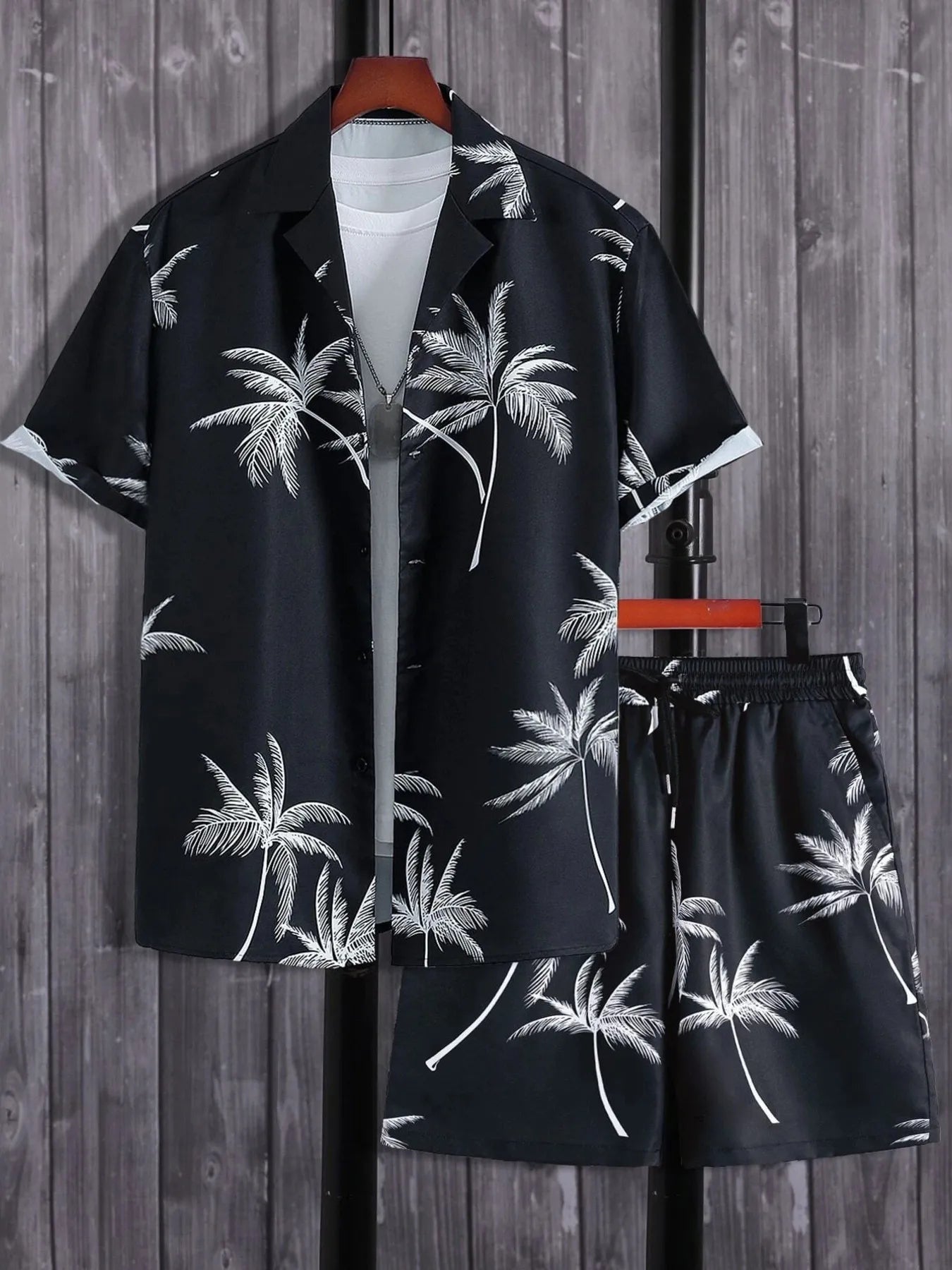 Men's palm print button-up shirt and shorts set, black with white palm leaves.