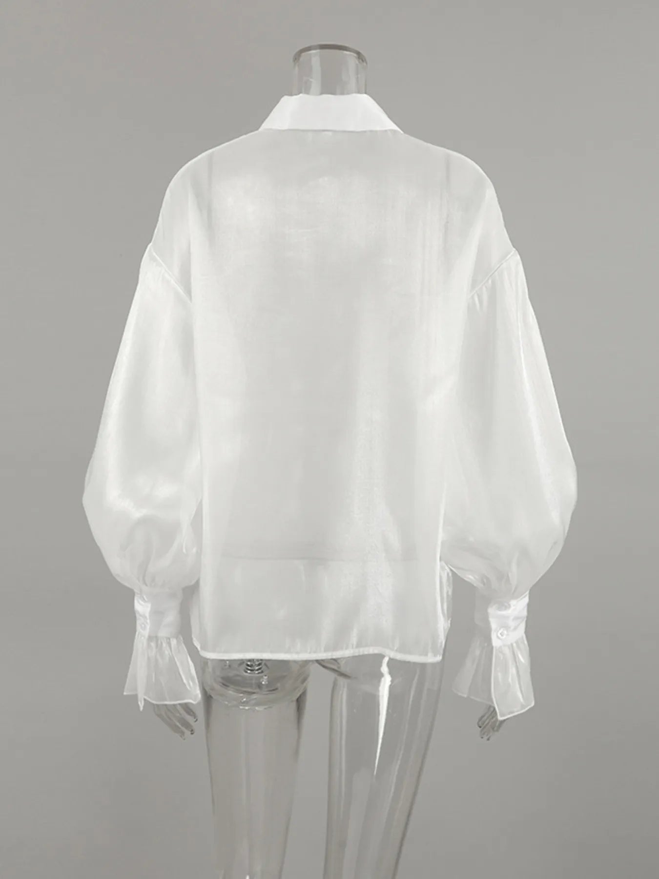 White button-up flounce sleeve shirt, back view, with gathered sleeve cuffs