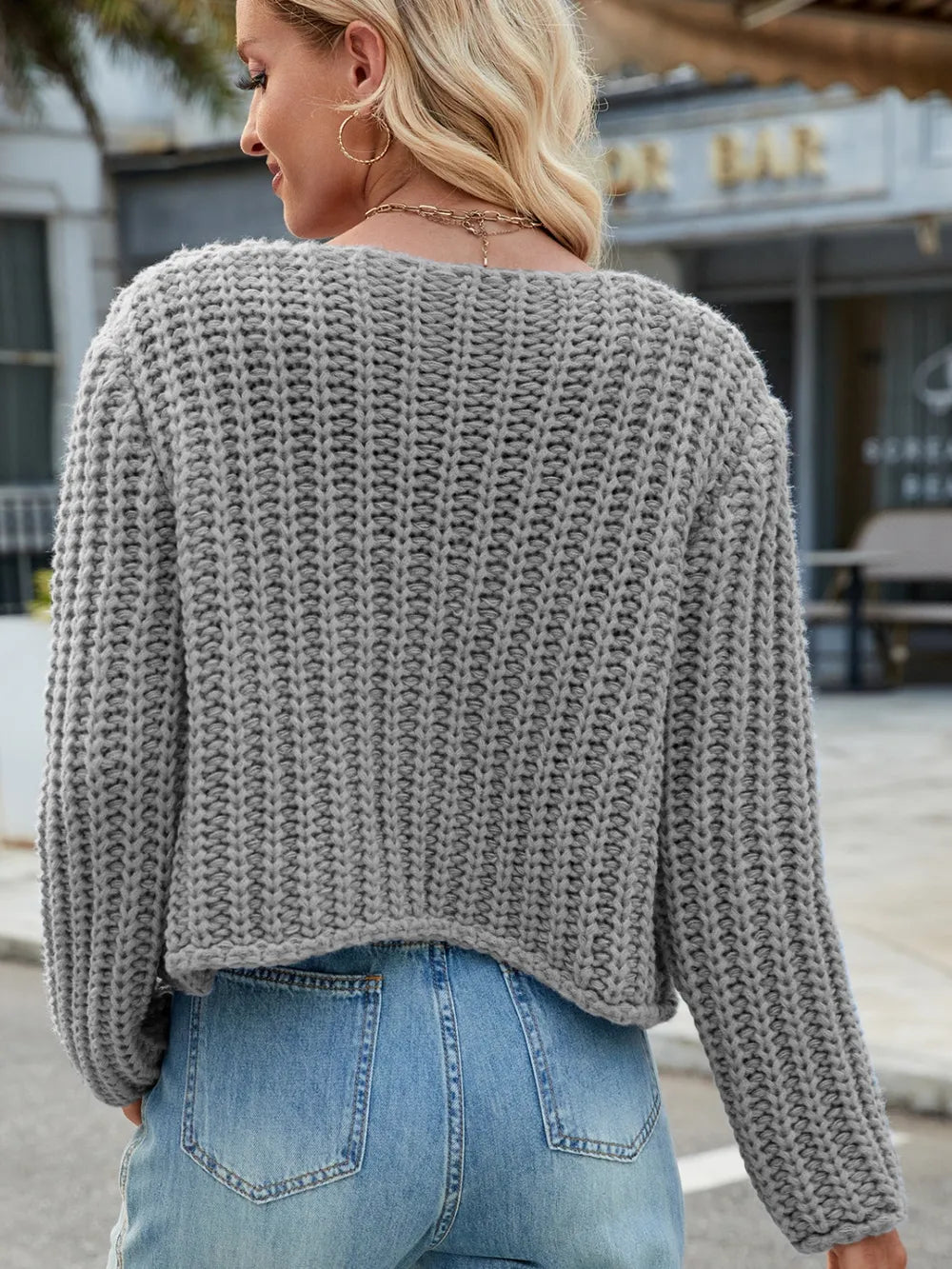 Gray chunky-knit button cardigan, back view with long sleeves