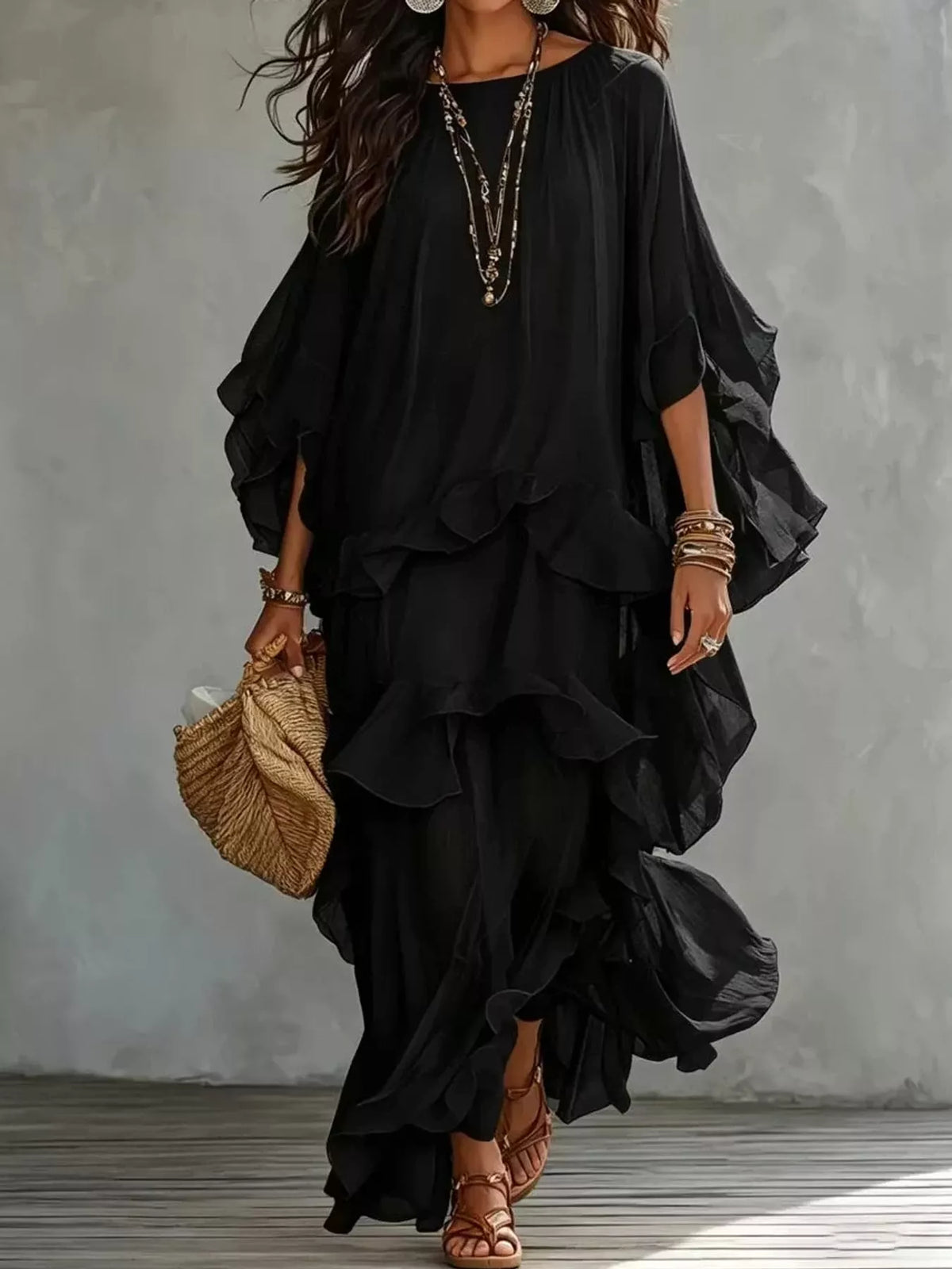 Black ruffled layered bohemian maxi dress with flowing flutter sleeves
