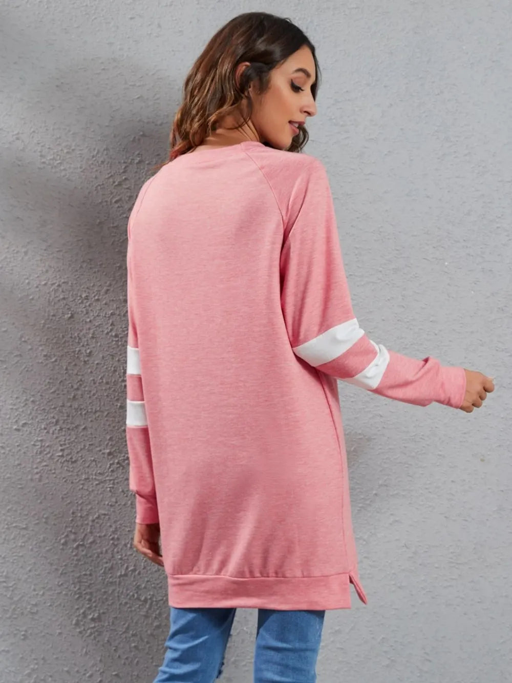 Pink striped long-sleeve round-neck T-shirt with white sleeve stripe detail
