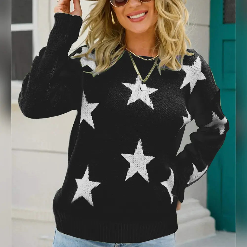 Black star-print round-neck sweater with white stars and ribbed cuffs