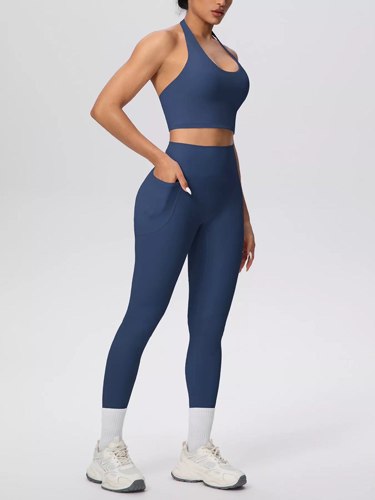 Dusty blue halter crop top and high-waist pocketed leggings set with contrast hem