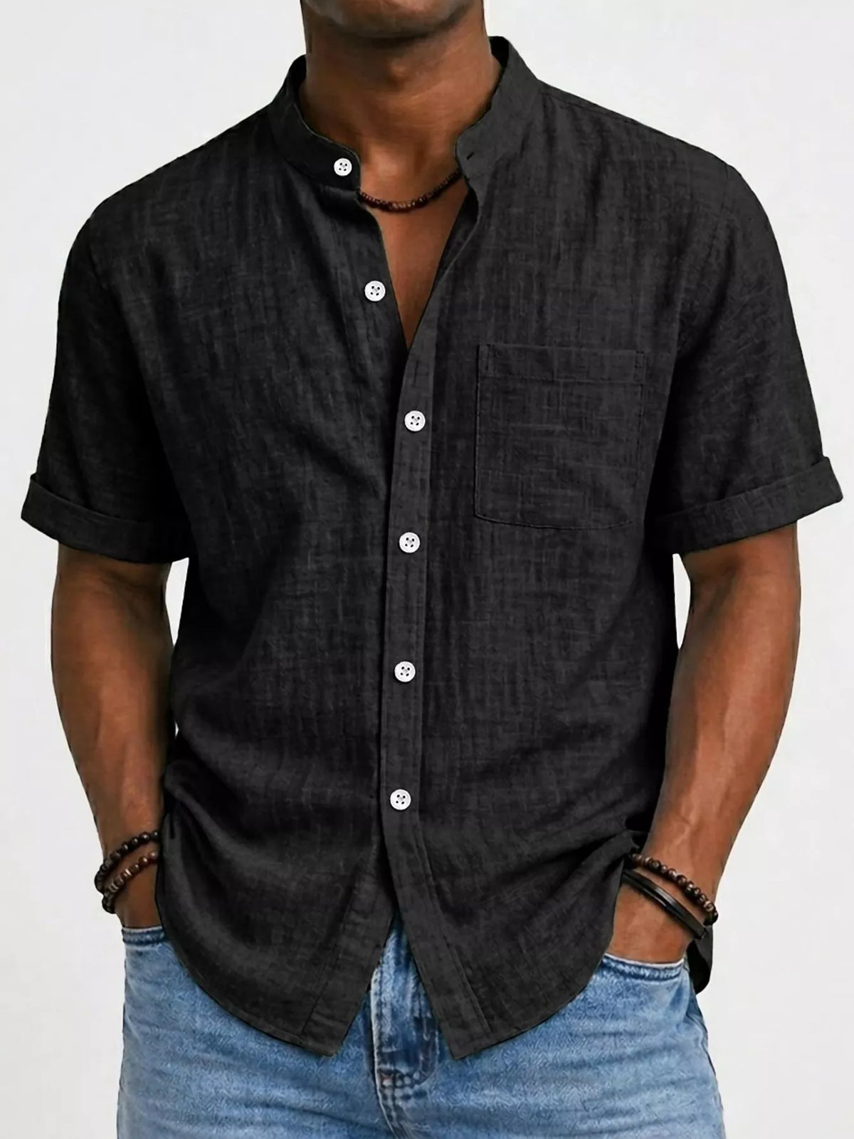 Men's short-sleeve button-up cotton shirt in black, chest pocket