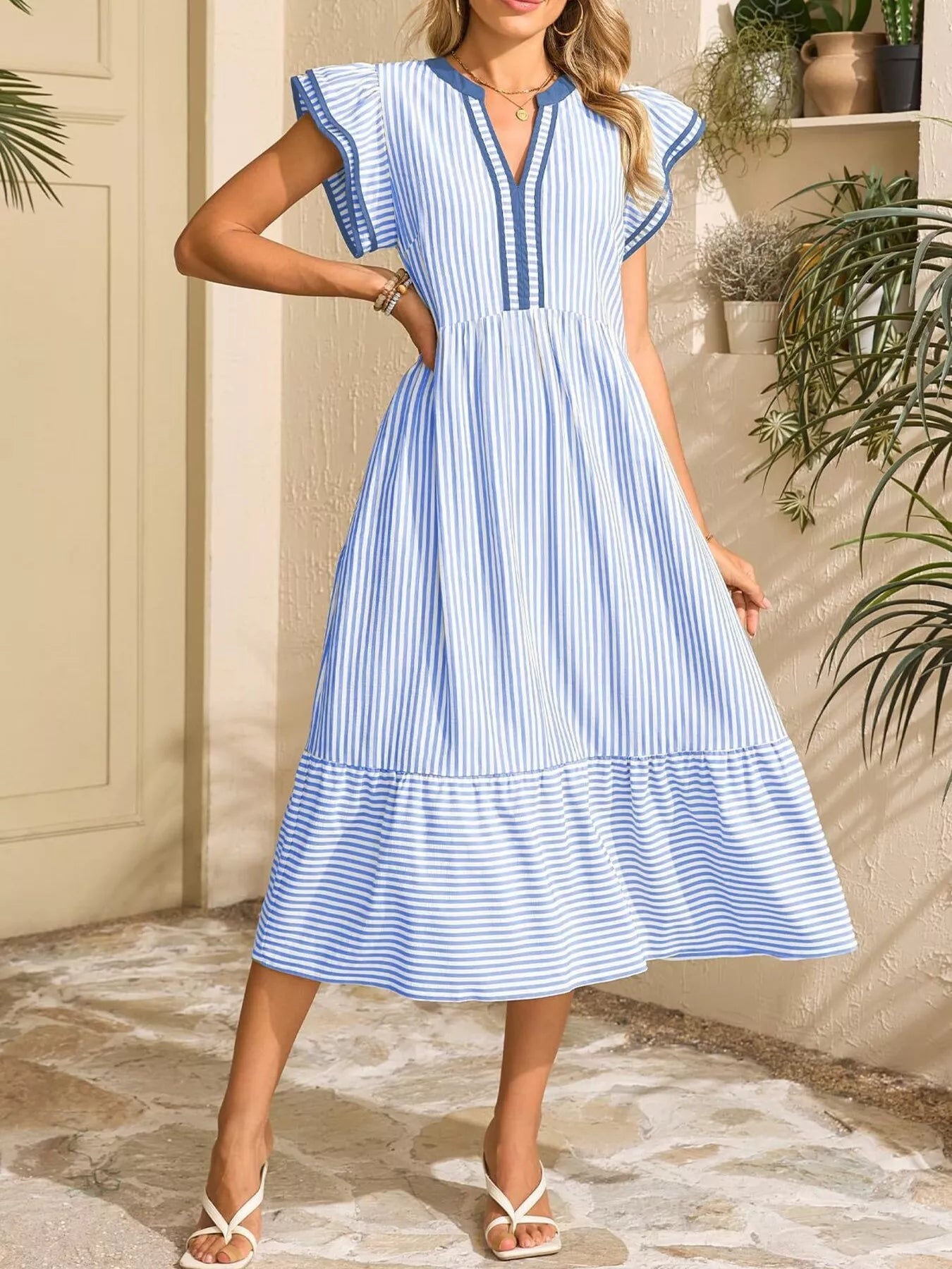 Striped Notched Ruffle Sleeve Dress by Trendsi, blue and white, pocketed.