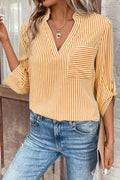 Gold and white striped notched V-neck shirt with chest pocket and roll-tab sleeves