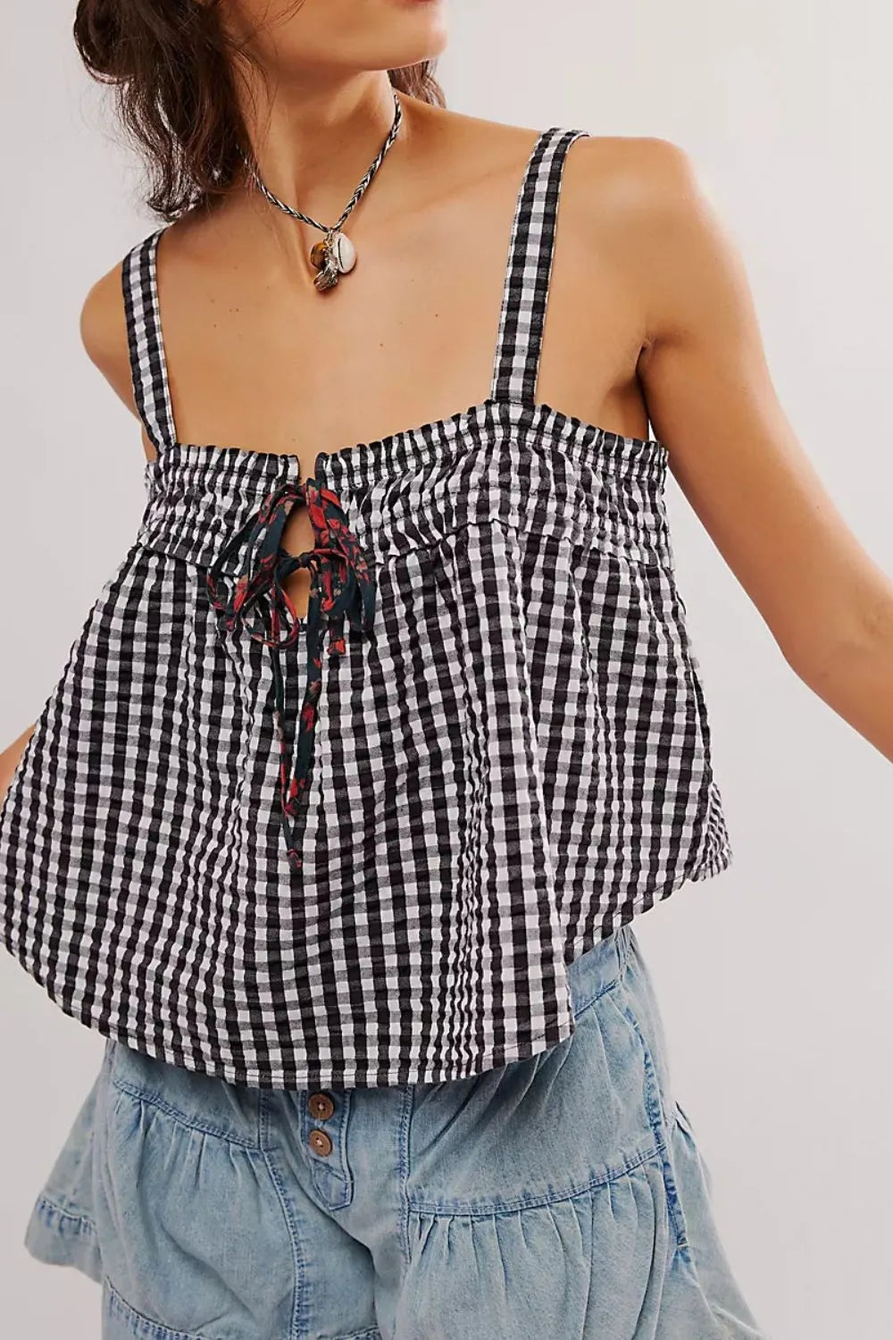 Black gingham square-neck cami with tie-front tassel detail and smocked top
