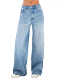 High-waisted wide-leg light blue jeans with button closure and front pockets