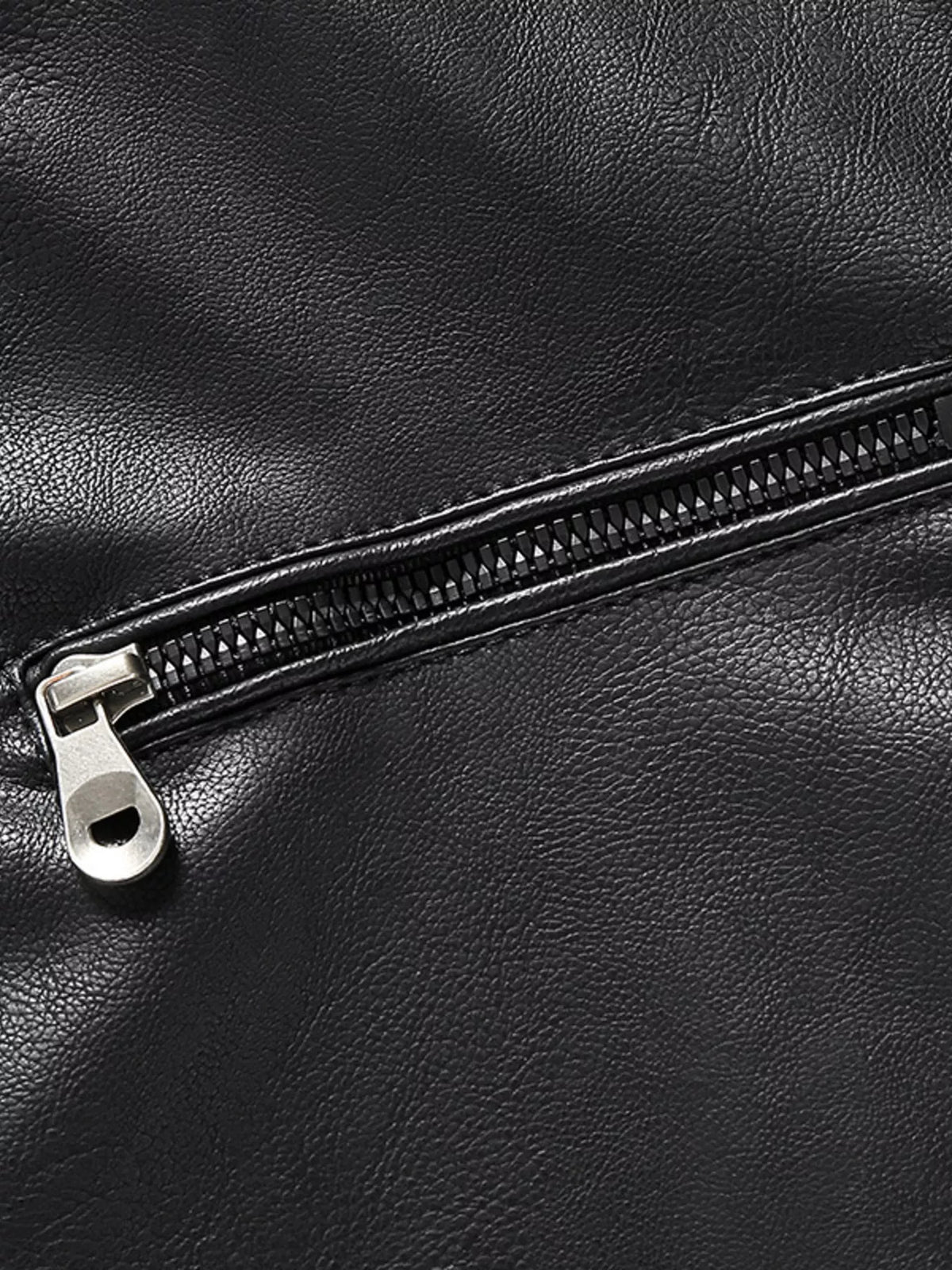 Men’s black vegan leather jacket zipper close-up with metal pull