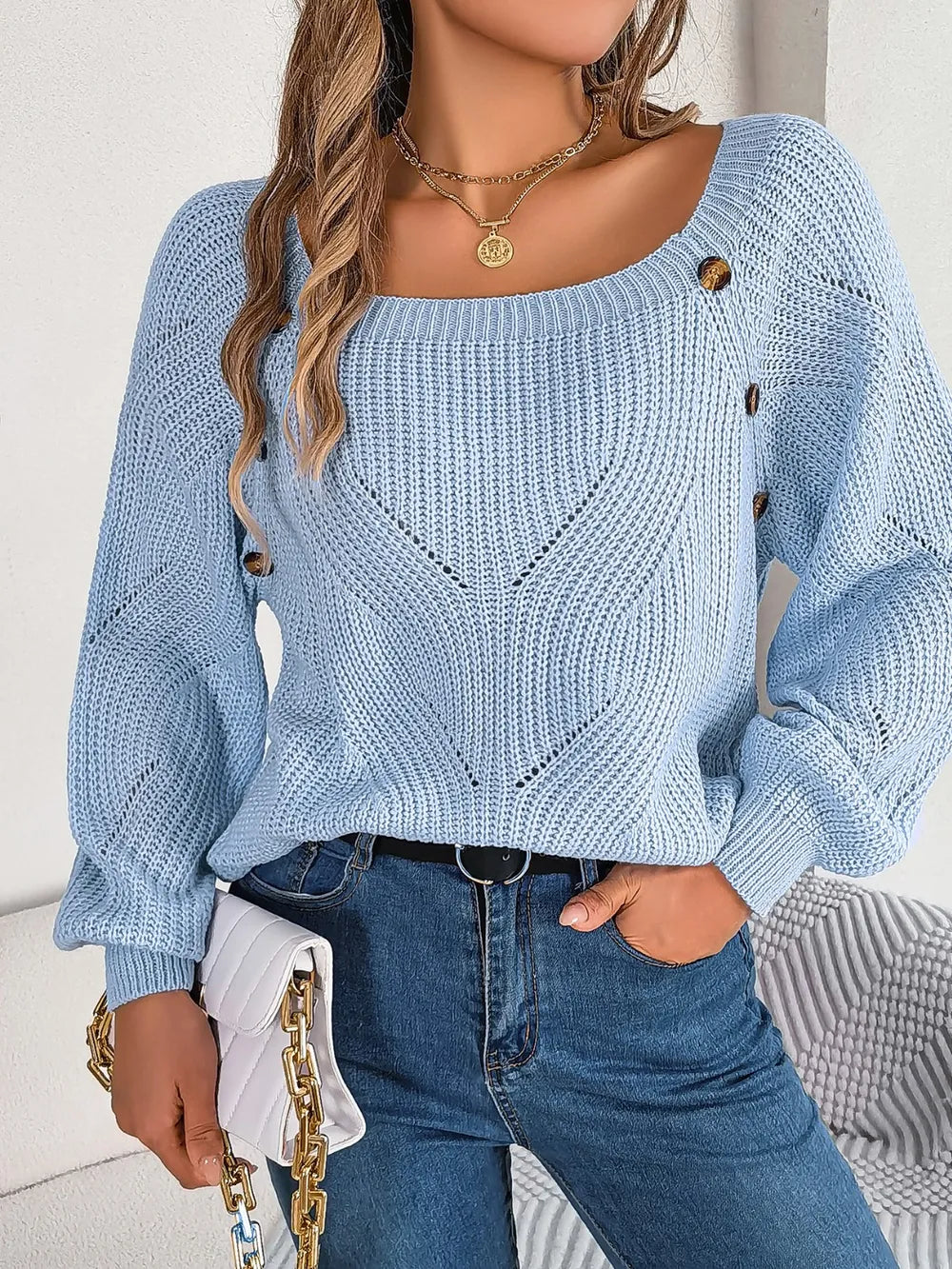 Misty blue openwork knit sweater with square neck and small shoulder button details