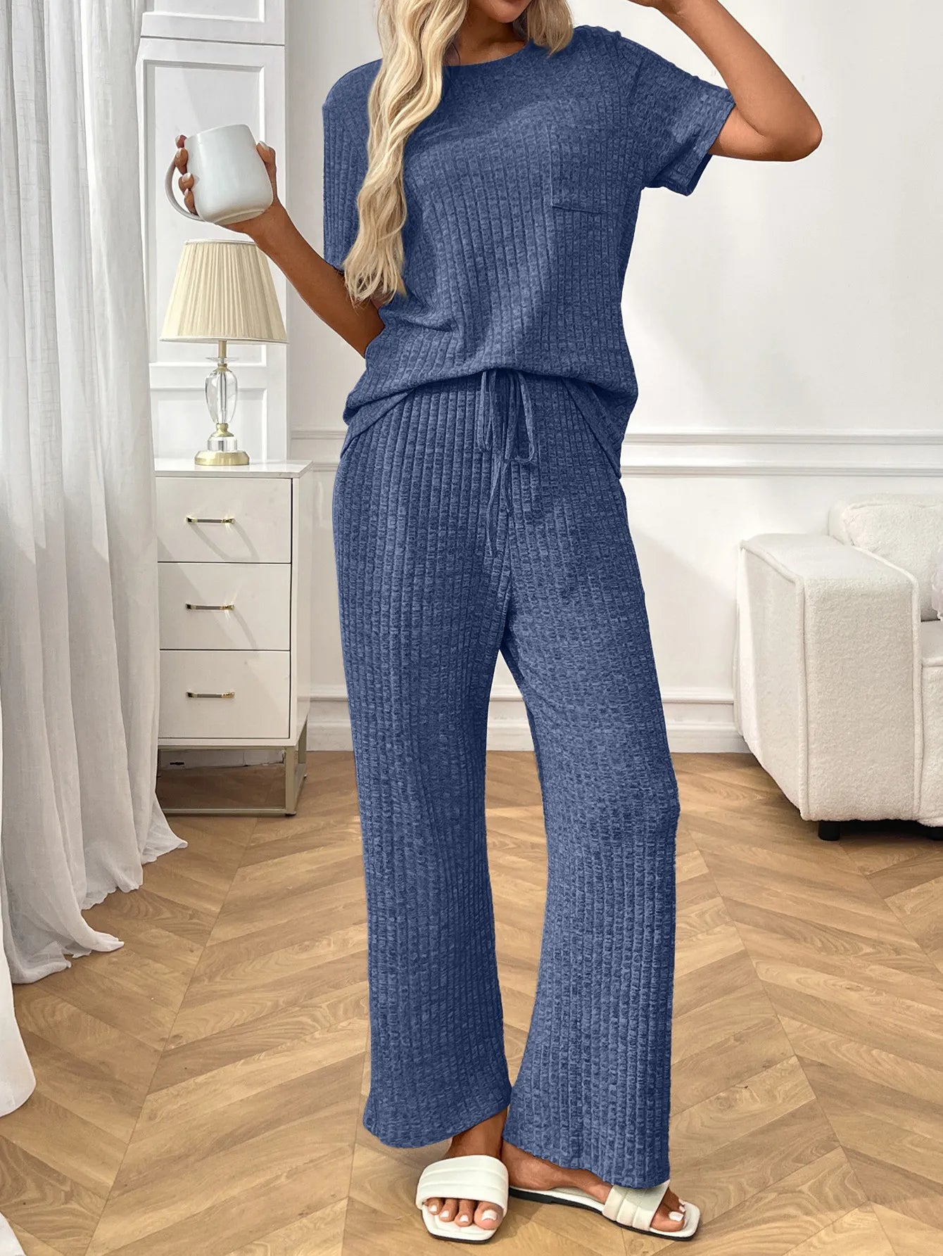 Ribbed knit lounge set in blue featuring short sleeve top and matching wide-leg pants