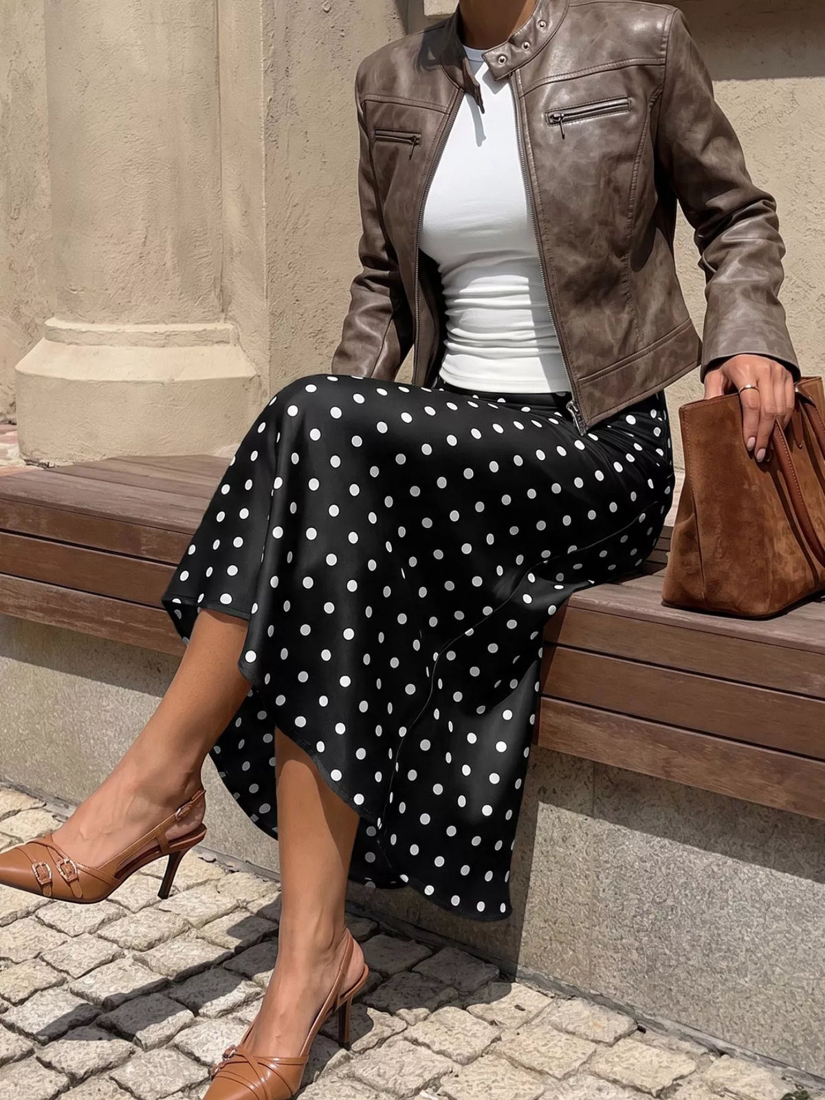 Black midi skirt with white polka dots, gathered A-line drape