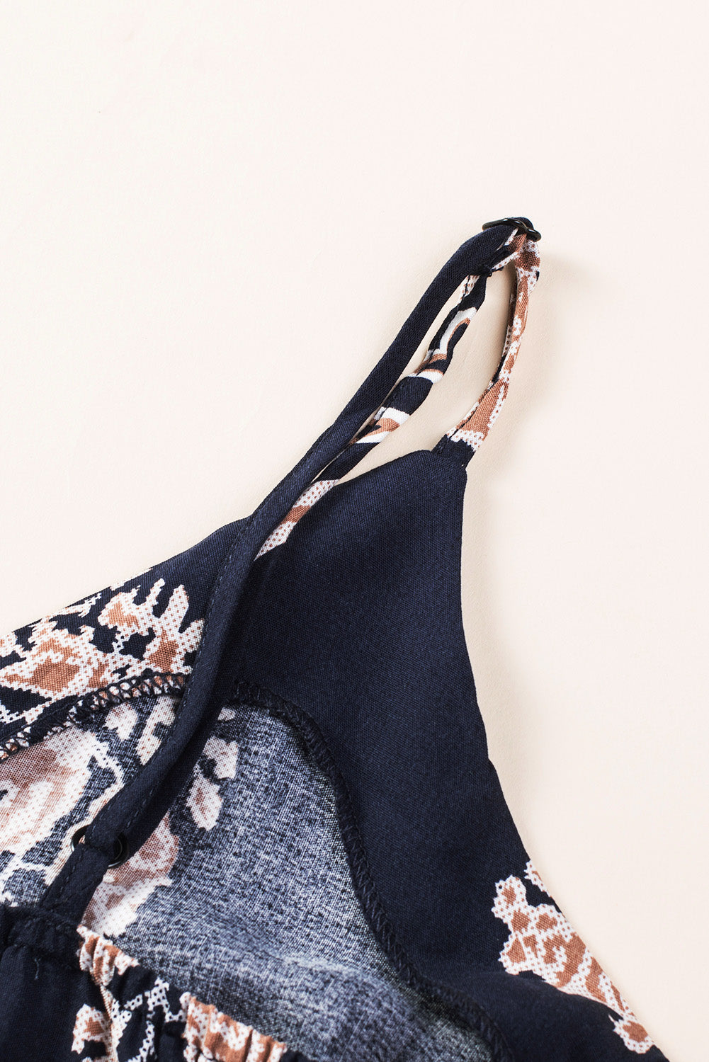 Dark blue printed jumpsuit bodice with adjustable shoulder strap and V-neck