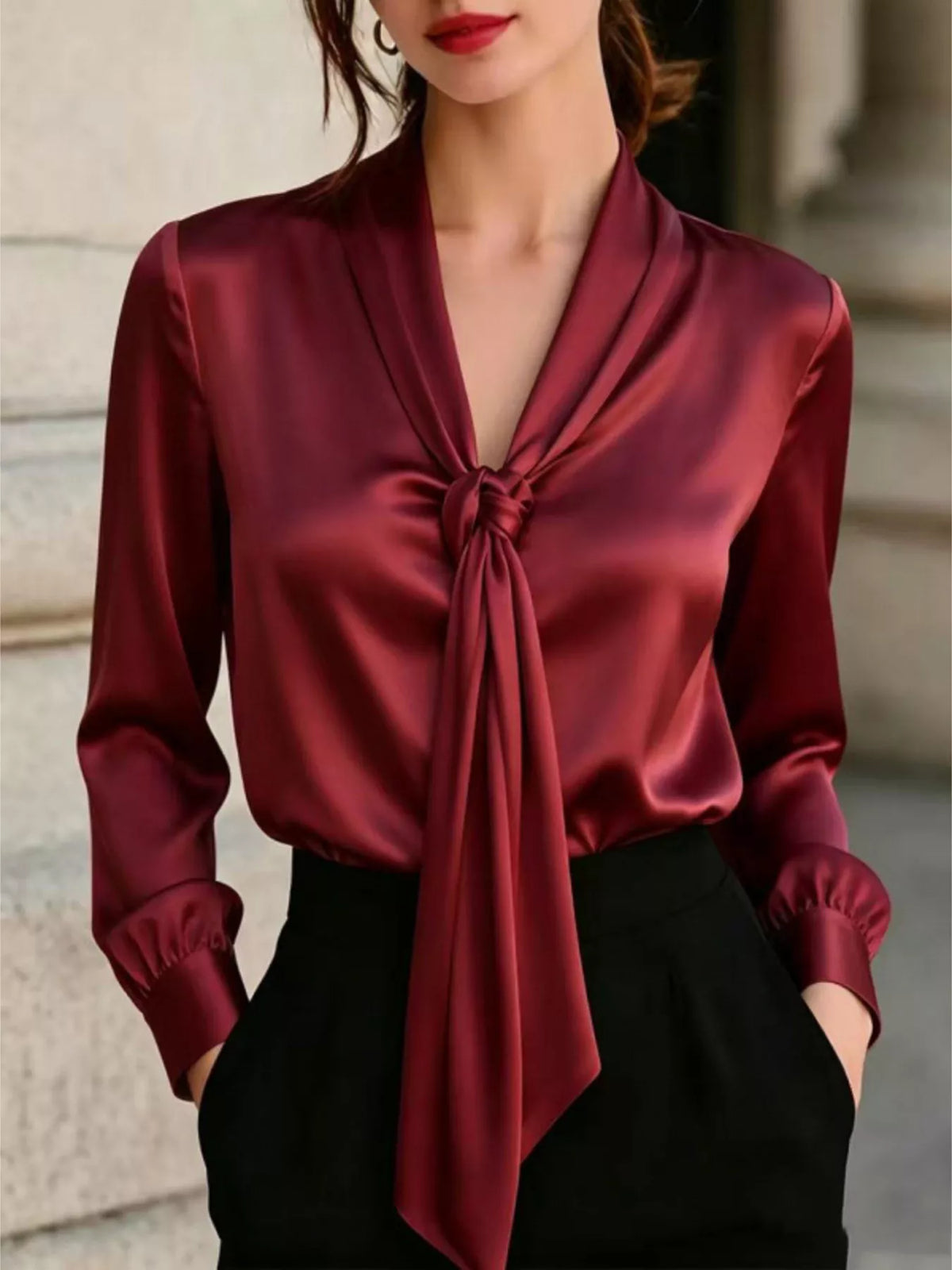 Burgundy satin blouse with V-neck front tie and long sleeves