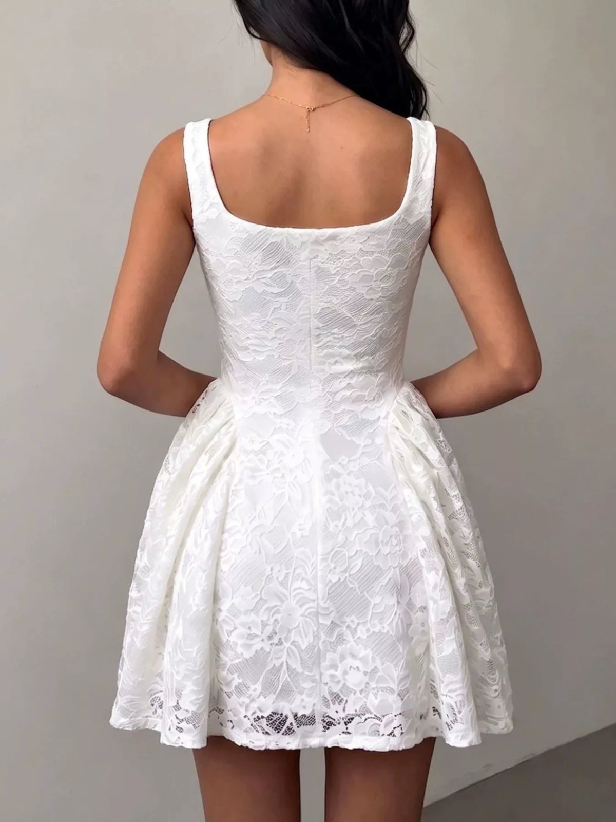 White lace square-neck sleeveless dress, open-back with floral fabric overlay