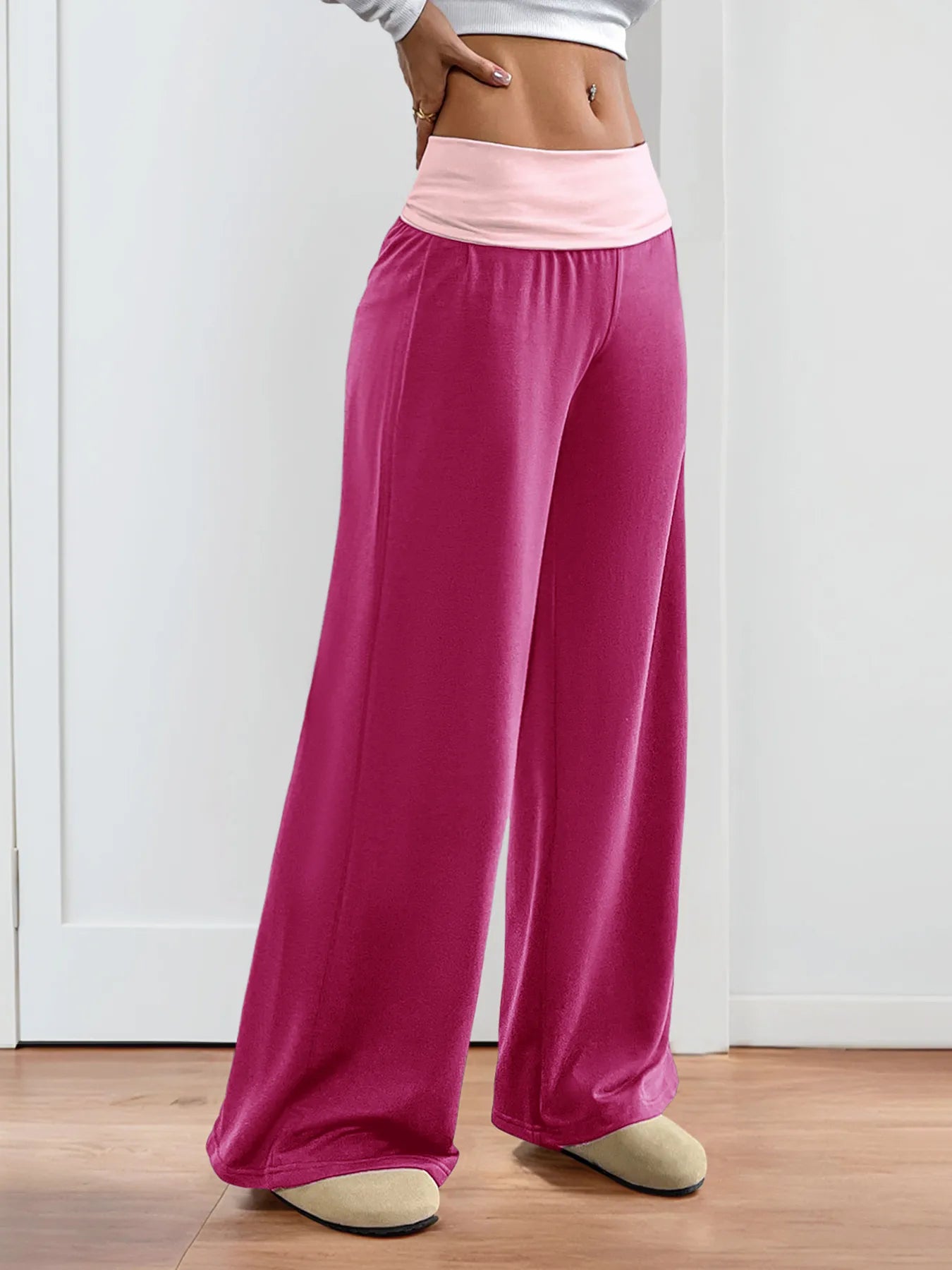 Hot pink wide-leg pants with light pink contrast waistband, front view