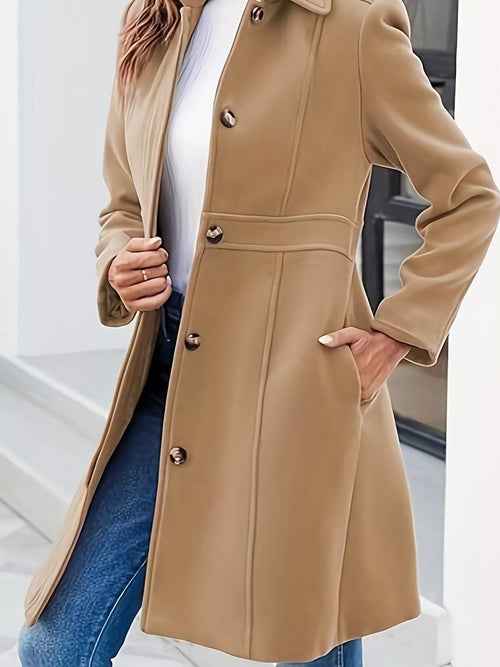 Button-down wool-blend coat in tan with long sleeves, belt loops, and patch pockets.